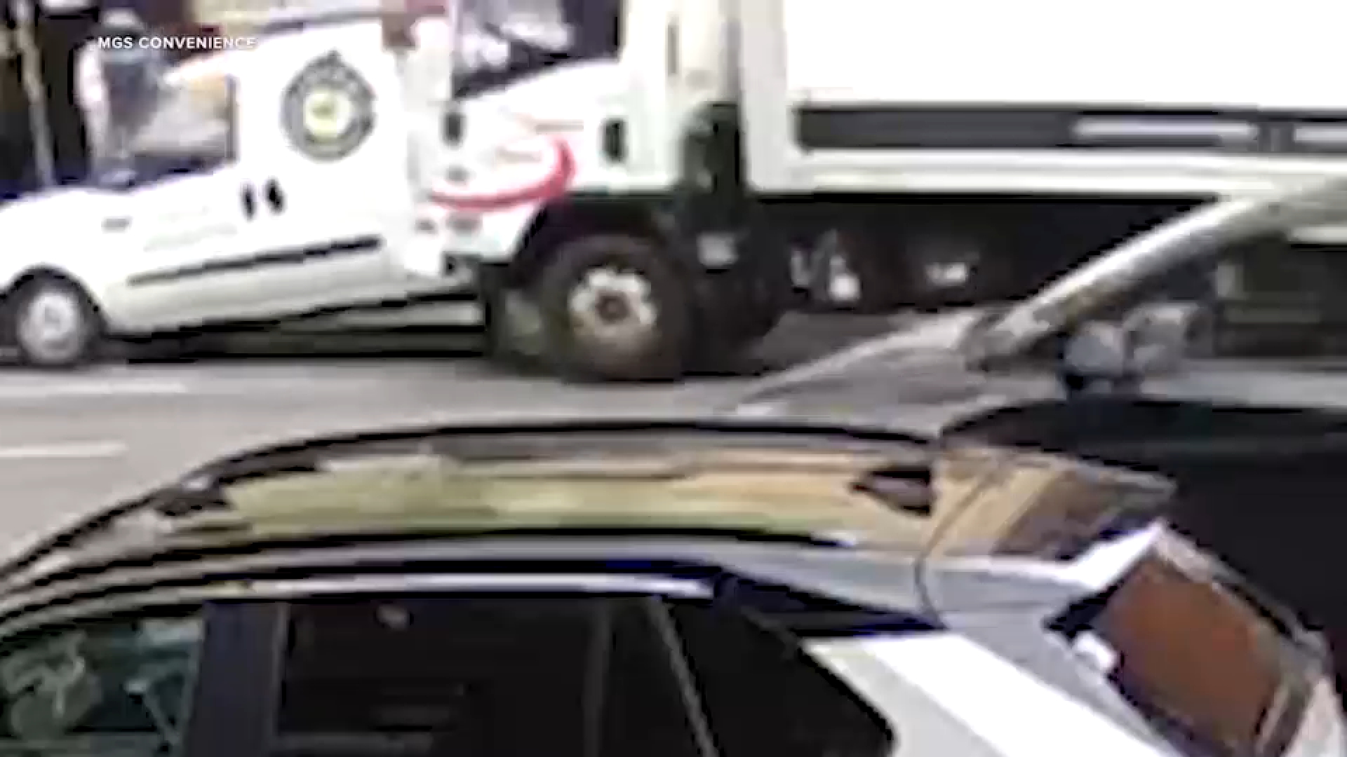 Video shows box truck slam into parked van in Midtown, injuring 10 people