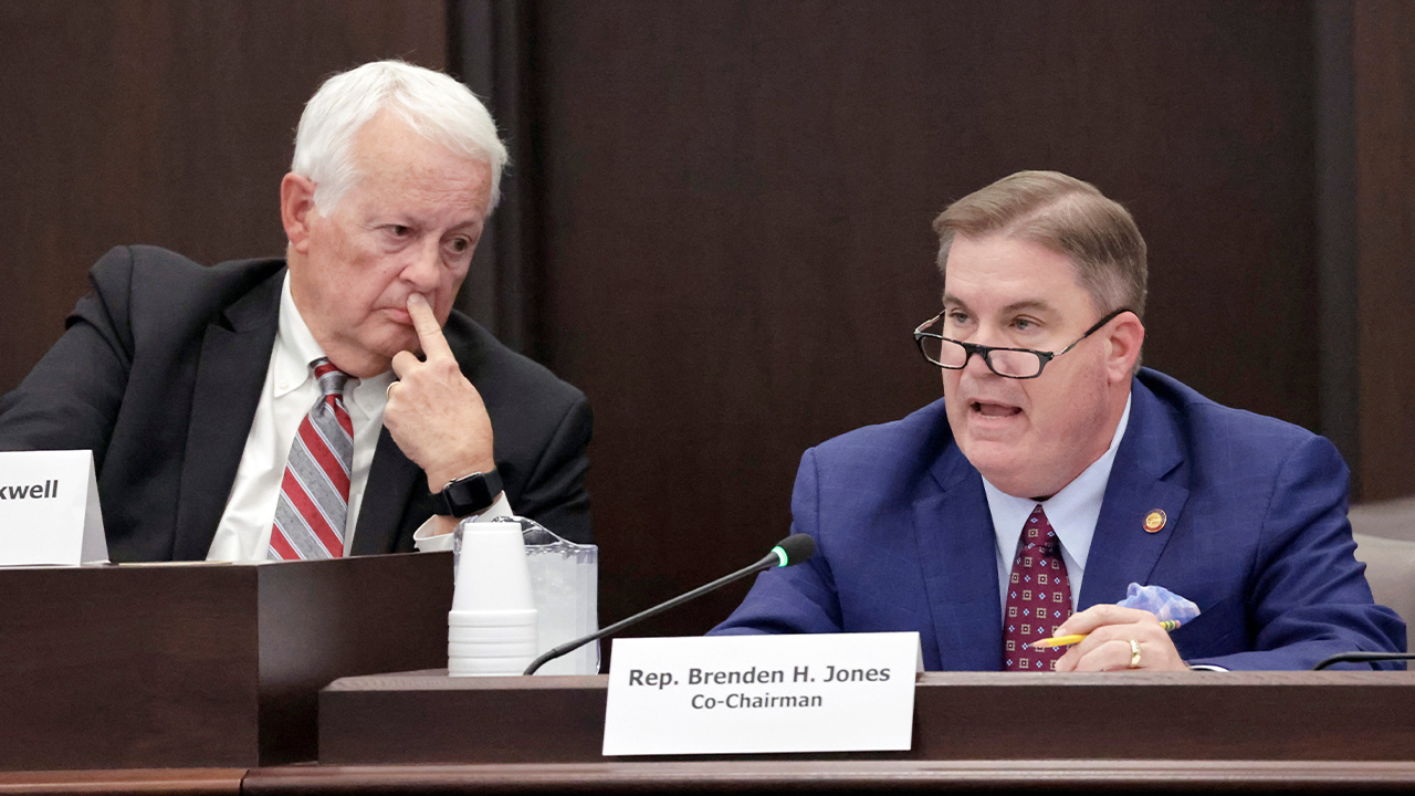 House Redistricting Committee Co-Chairs Rep. Hugh Blackwell, R- Burke listens as Rep. Brenden Jones, R-Columbus, right, speaks during meeting on proposed redistricting map.
