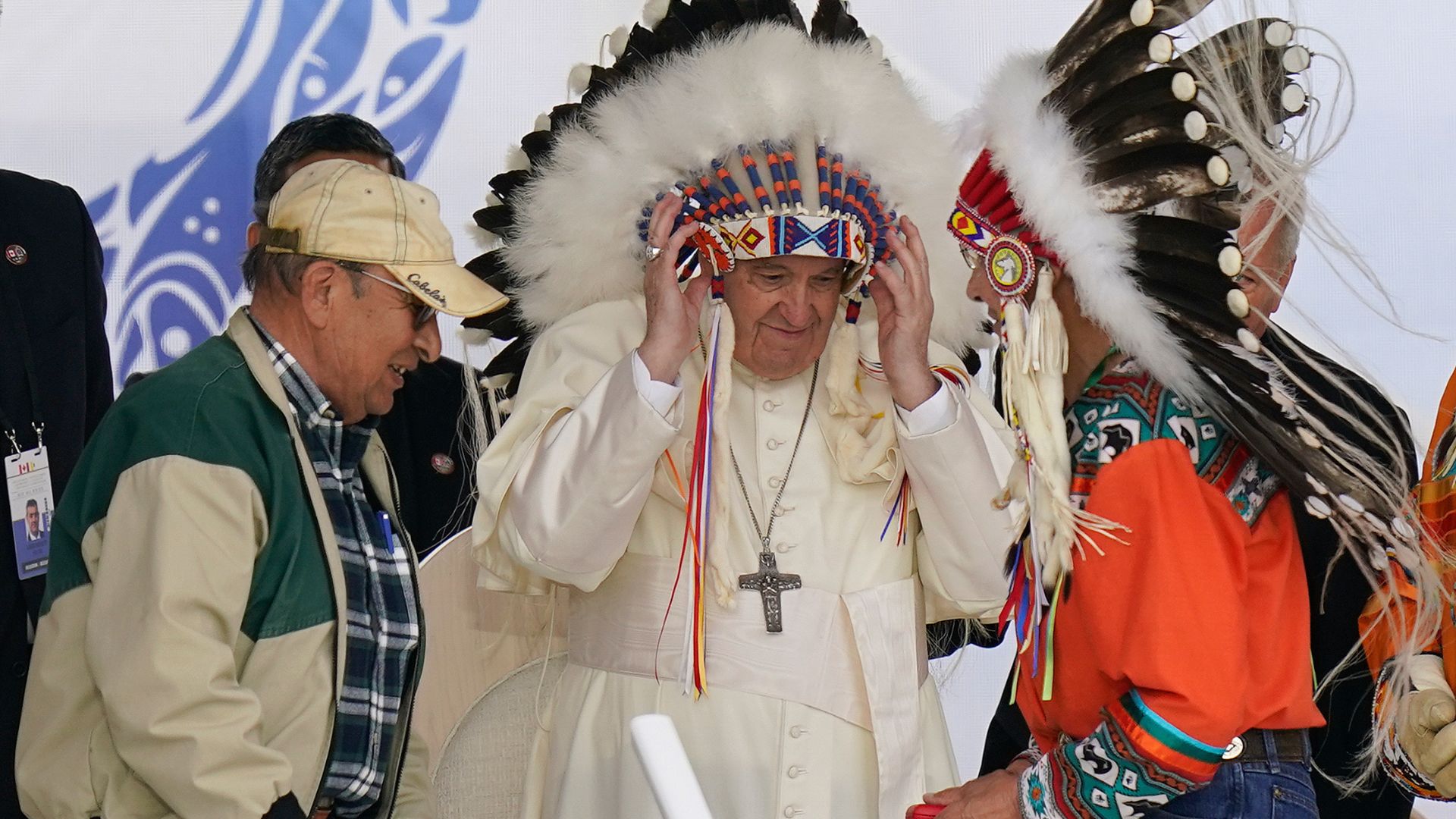 FILE - Pope Francis dons a headdress during a visit with Indigenous peoples at Maskwaci, the former Ermineskin Residential School, Monday, July 25, 2022, in Maskwacis, Alberta.