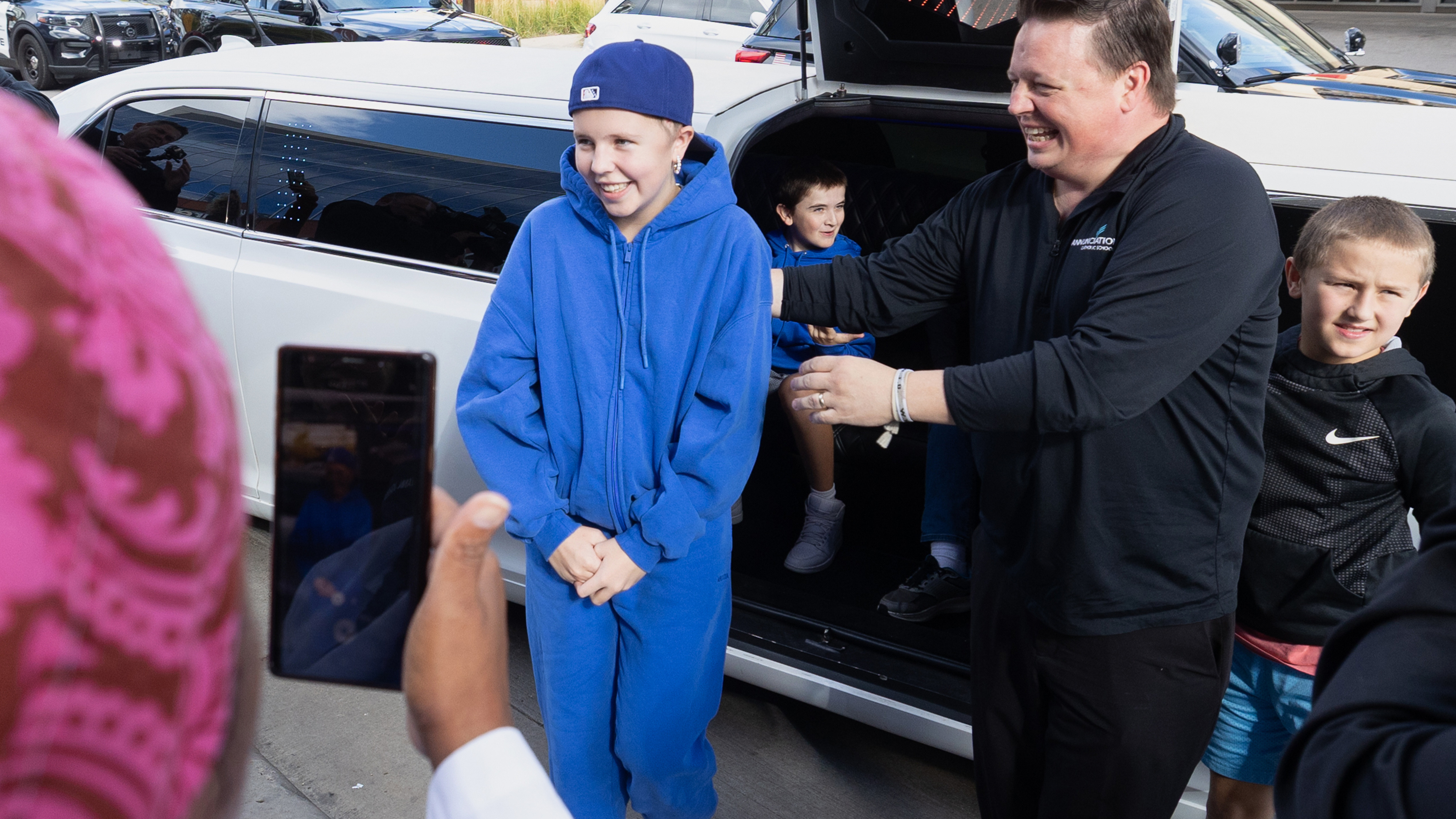 Sophia Forchas, an Annunciation Church and School mass shooting victim, and her father, Tom Forchas, right, arrive at the Hennepin County Medical Center on Thursday, Oct. 23, 2025, in Minneapolis.