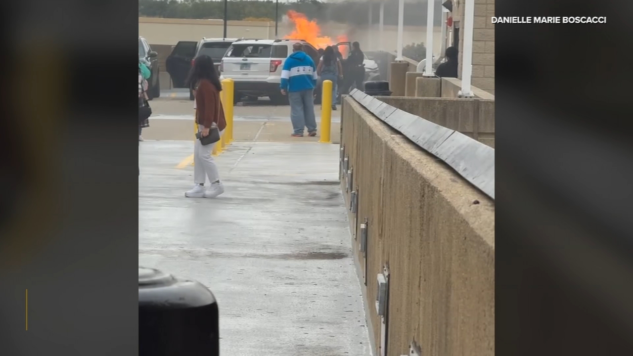 Video shows person being rescued from burning car at Woodfield mall