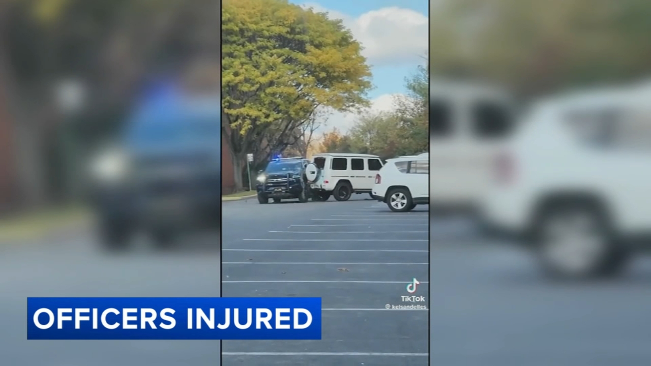Video shows driver's parking lot rampage that injured officers