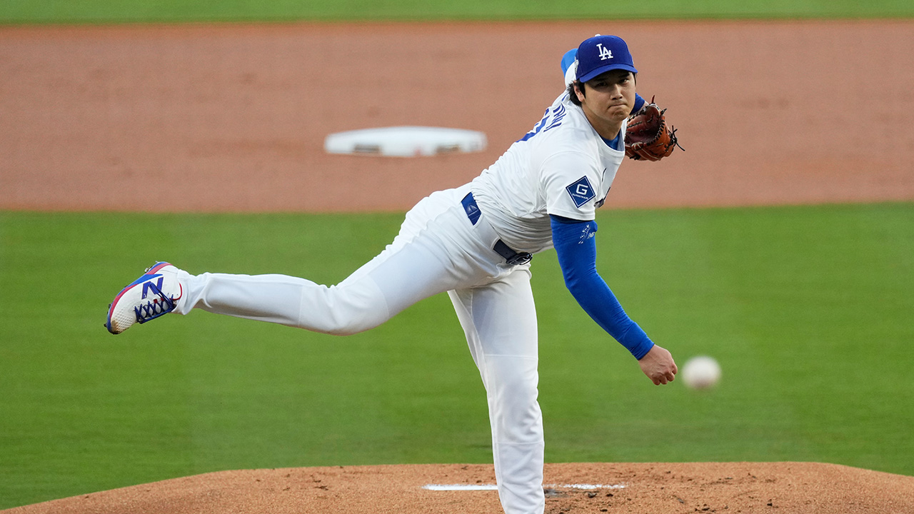 Dodgers pitcher Shohei Ohtani throws against the Toronto Blue Jays during the first inning in Game 4 of baseball's World Series, Tuesday, Oct. 28, 2025, in Los Angeles.