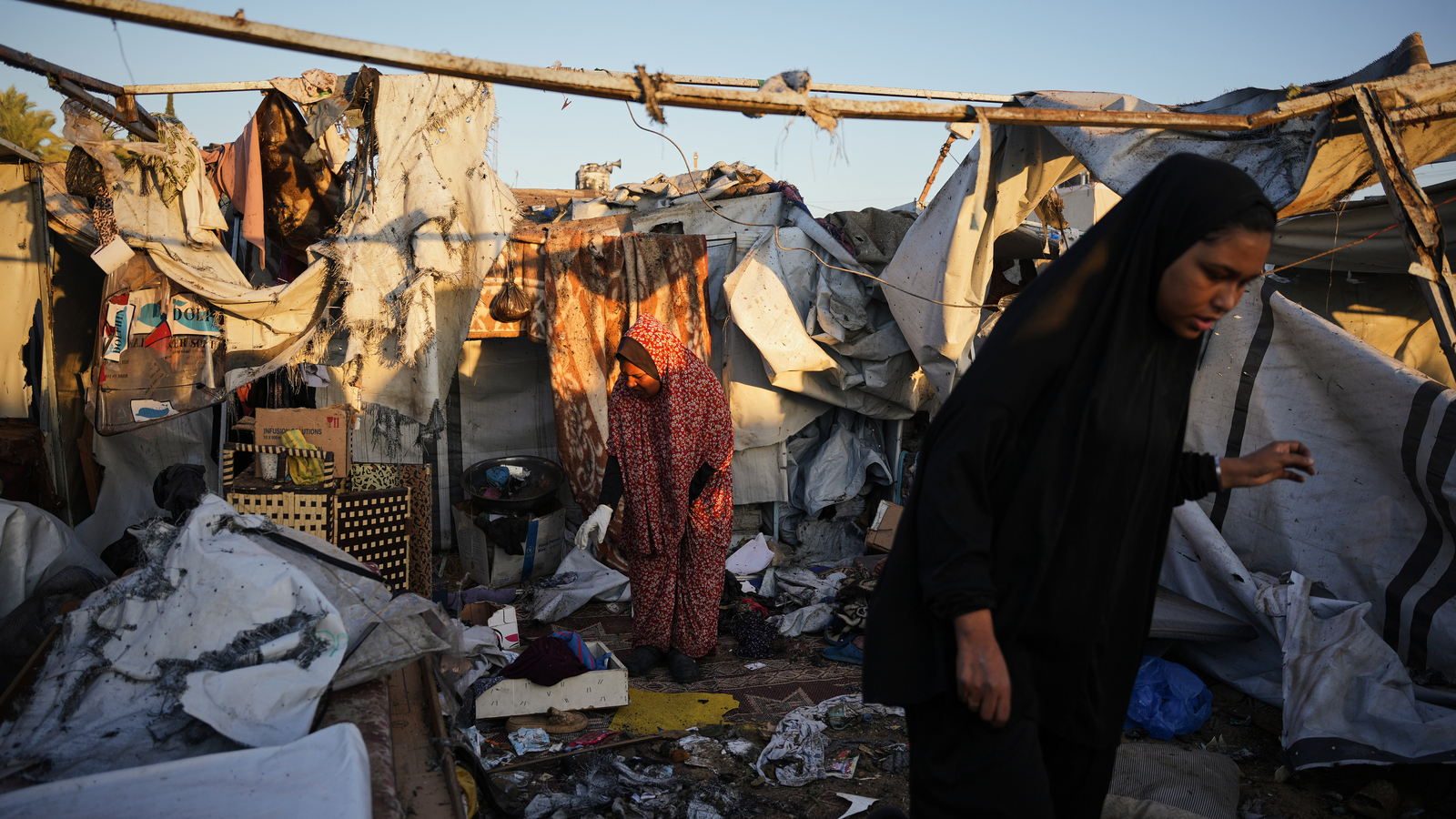 Israel's military says ceasefire is back on as death toll from overnight strikes in Gaza reaches 104