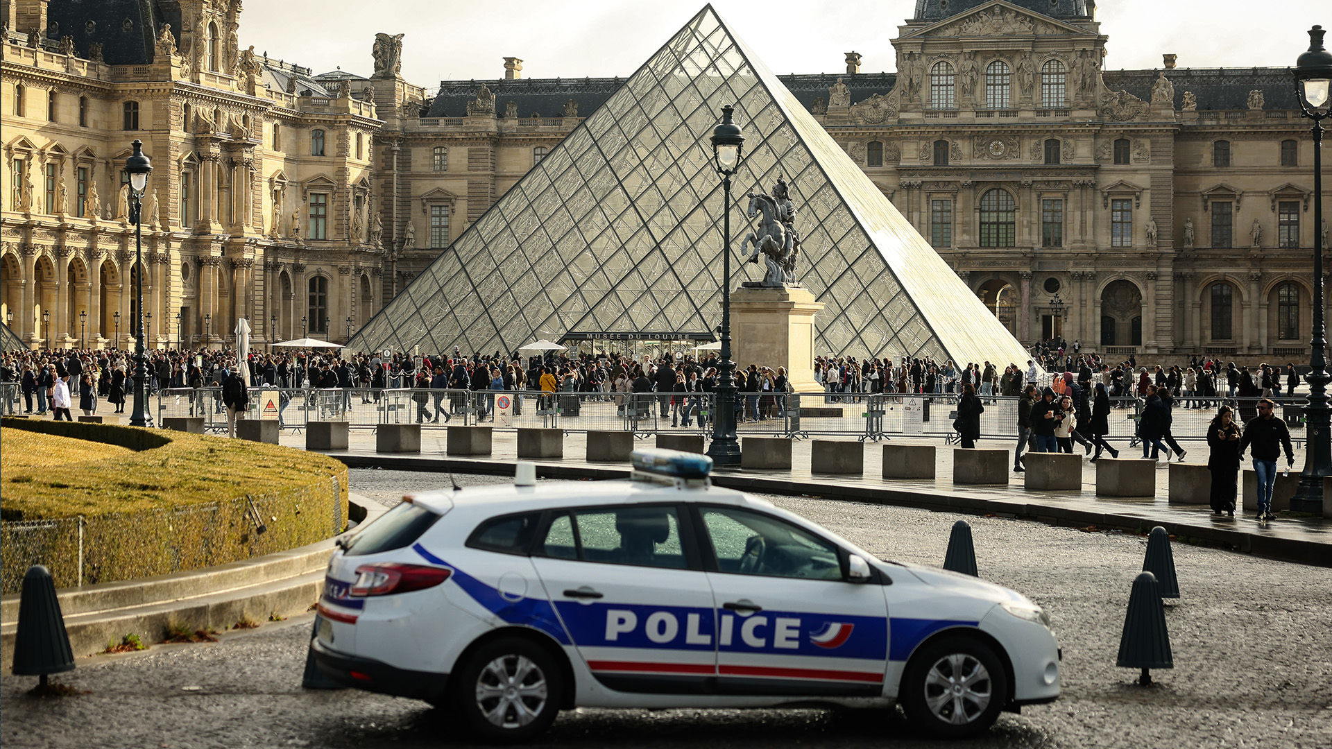 A police car parks in the courtyard of the Louvre museum, one week after the robbery, Sunday, Oct. 26, 2025 in Paris.
