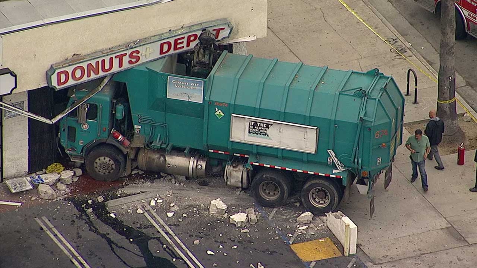 Sanitation truck barrels into Canoga Park business - ABC7 Los Angeles