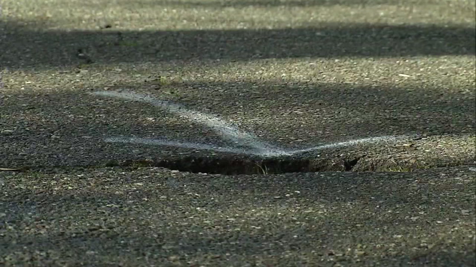 Oakland residents spray paint danger spots to warn drivers of potholes