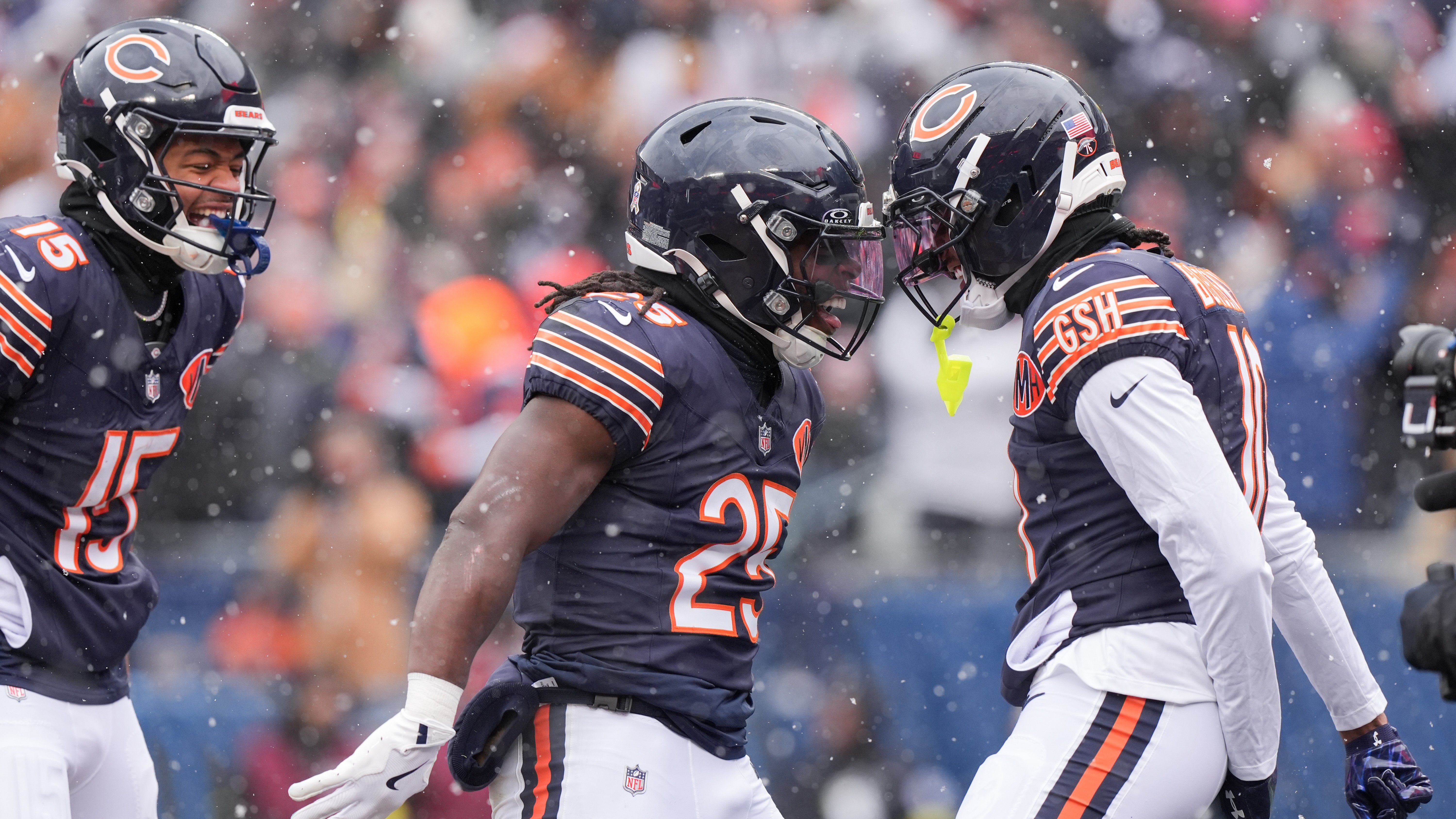 Chicago Bears running back Kyle Monangai celebrates with wide receiver Luther Burden III after scoring a touchdown against the New York Giants, Sunday, Nov. 9, 2025, in Chicago.