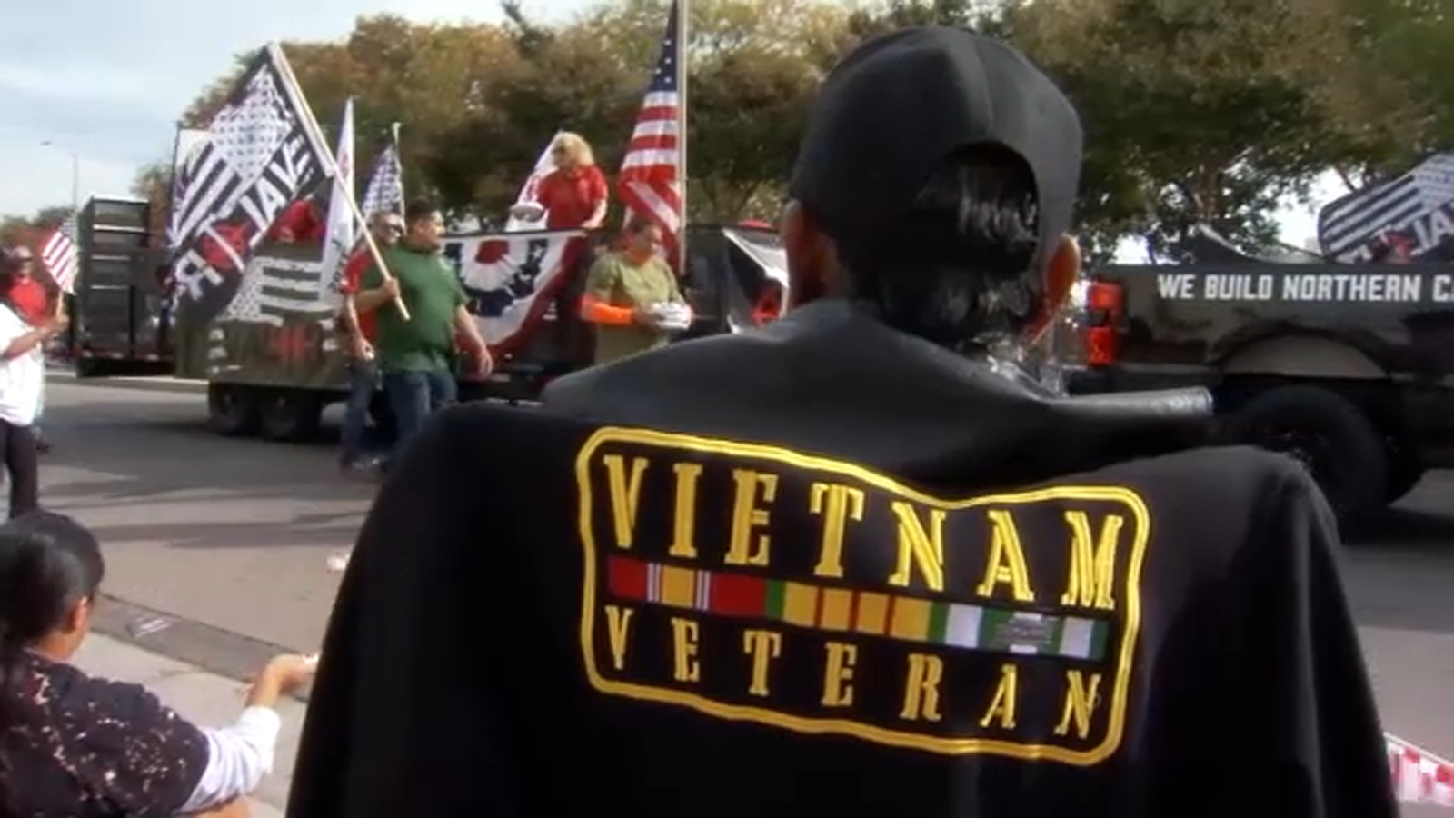 Flags fly through Downtown Fresno for Veterans Day Parade