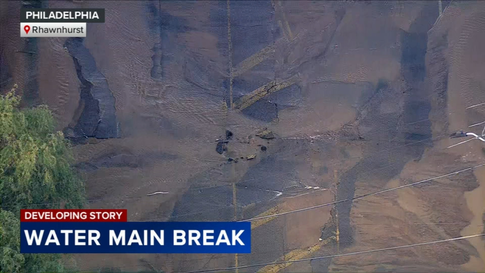 Water main break causes roadway to buckle in Philadelphia's Rhawnhurst ...
