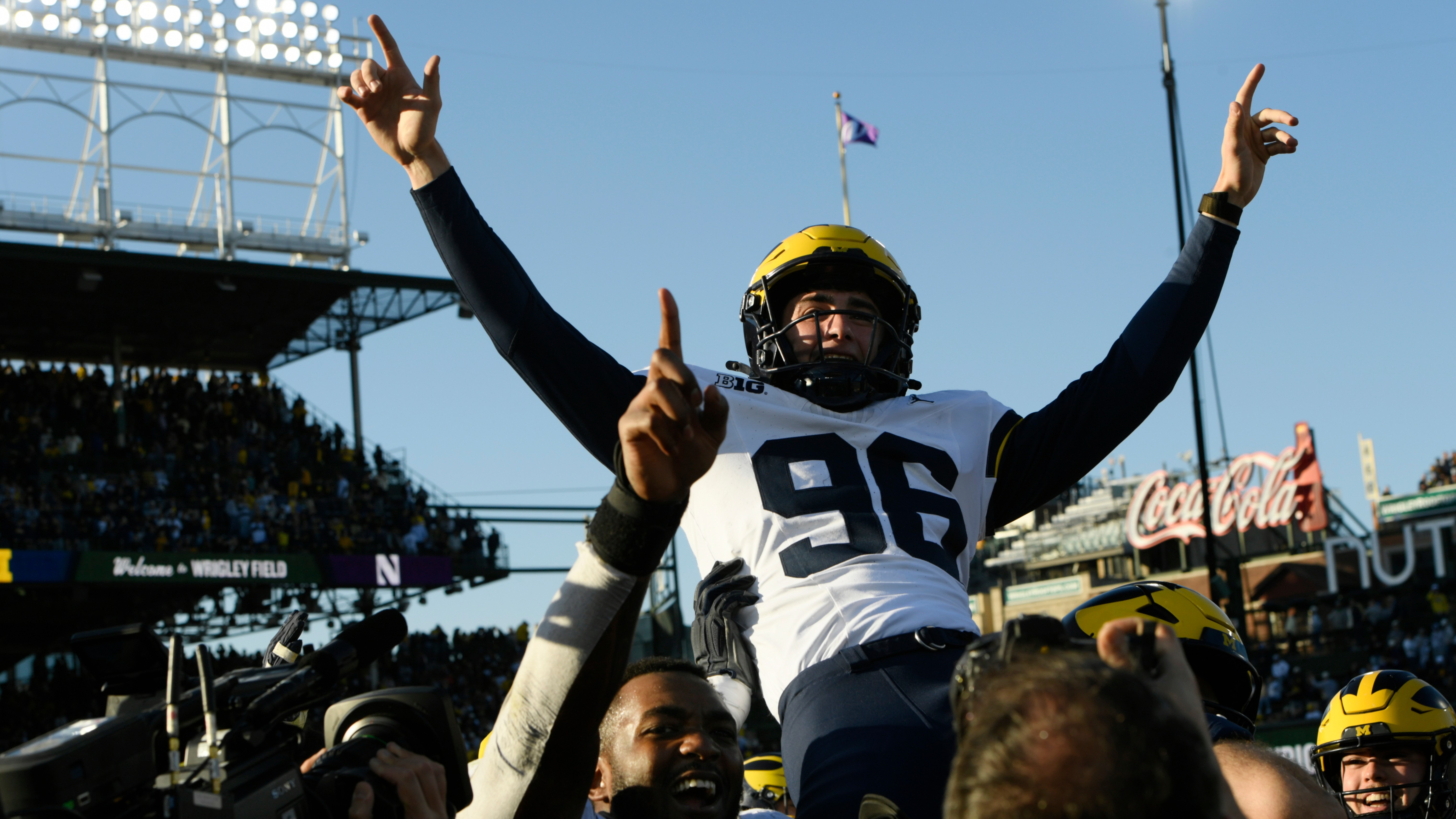 Michigan kicker Dominic Zvada celebrates after kicking the game winning field goal to defeat Northwestern in an NCAA football game Saturday, Nov. 15, 2025, in Chicago.