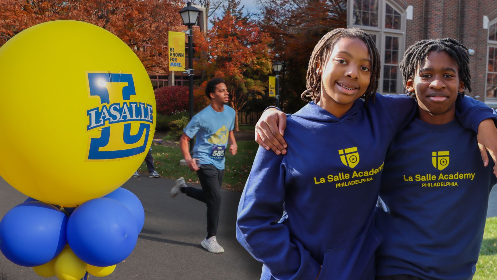 La Salle University runs to support their younger peers