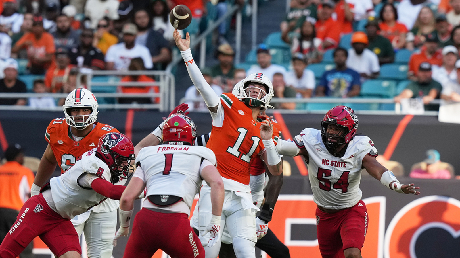 No. 15 Miami overwhelms listless NC State 41-7