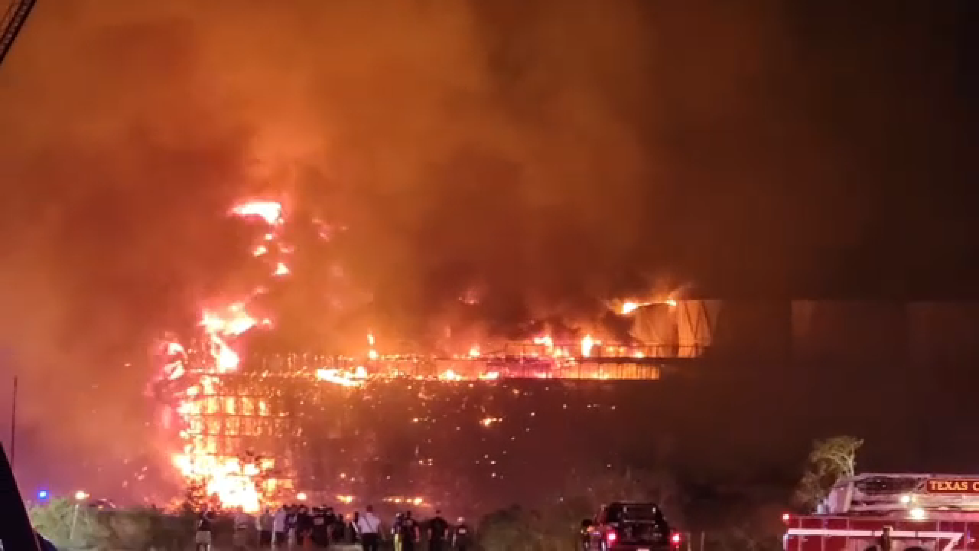 Images from the scene show firefighters battling a large structure fire off Highway 146 in Texas City early Sunday morning.