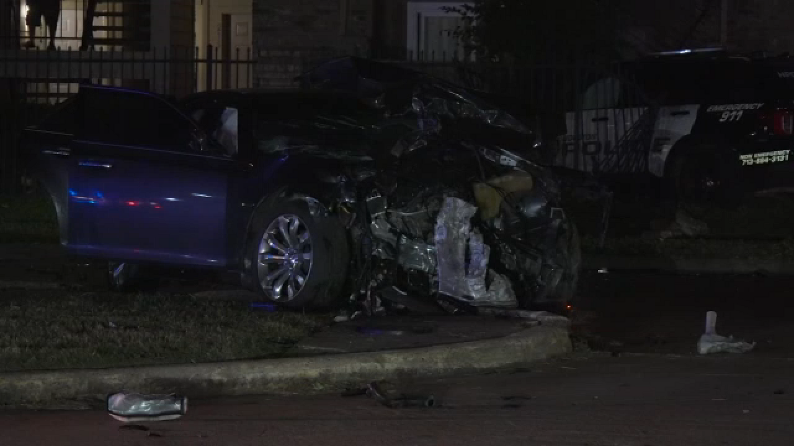 3 people hurt after police vehicle crashes into driver, apartment ...