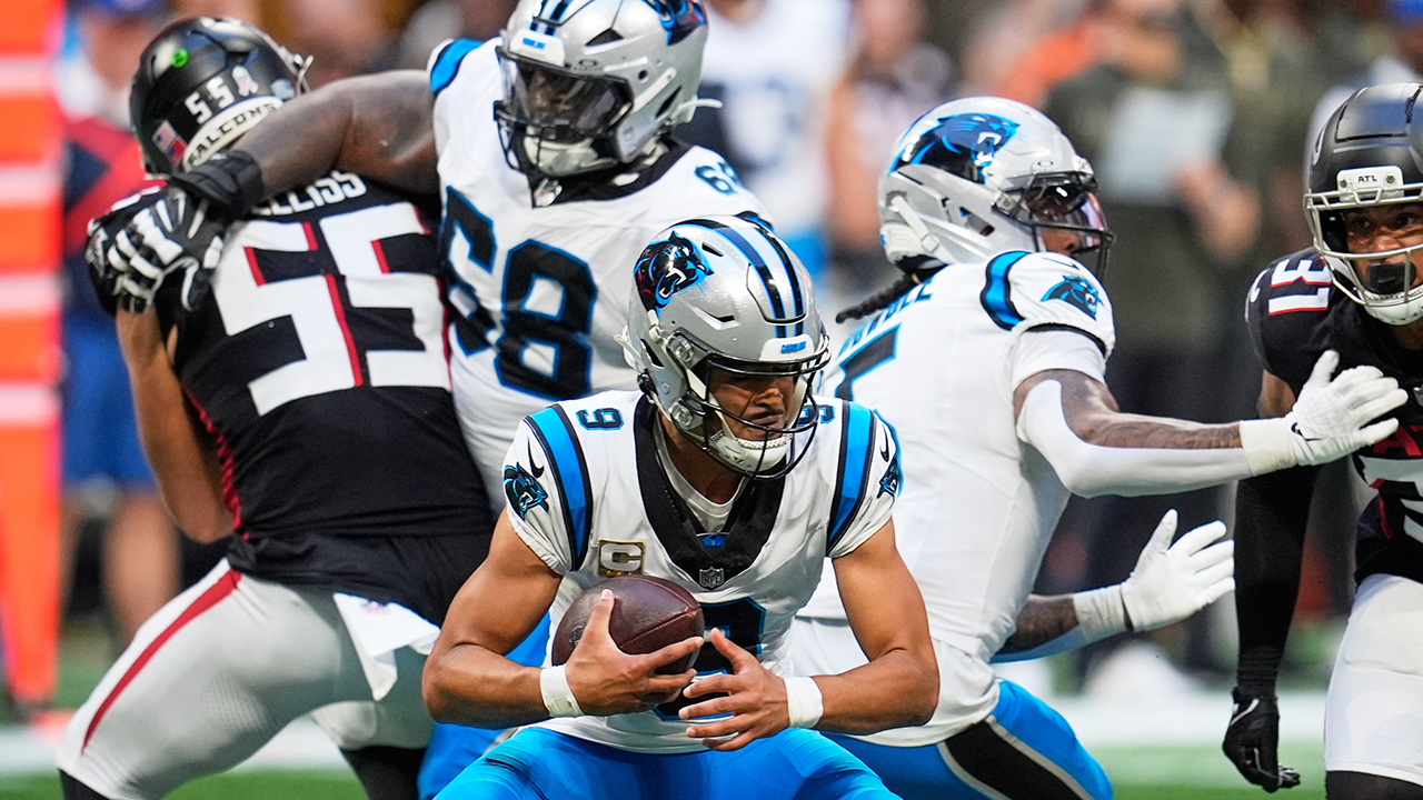Panthers quarterback Bryce Young scrambles against the Falcons on Sunday in Atlanta.