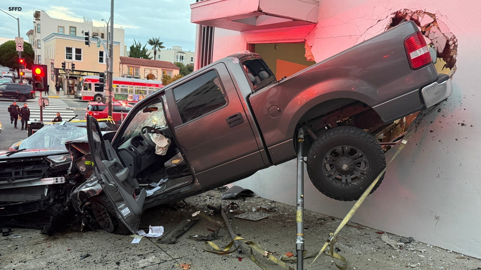 2 injured after high-speed SF crash leaves truck in building: officials