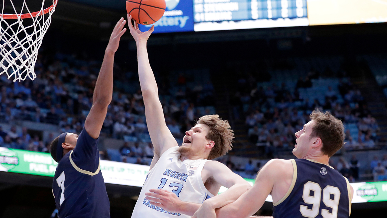 UNC center Henri Veesaar drives against Navy on Tuesday in Chapel Hill.