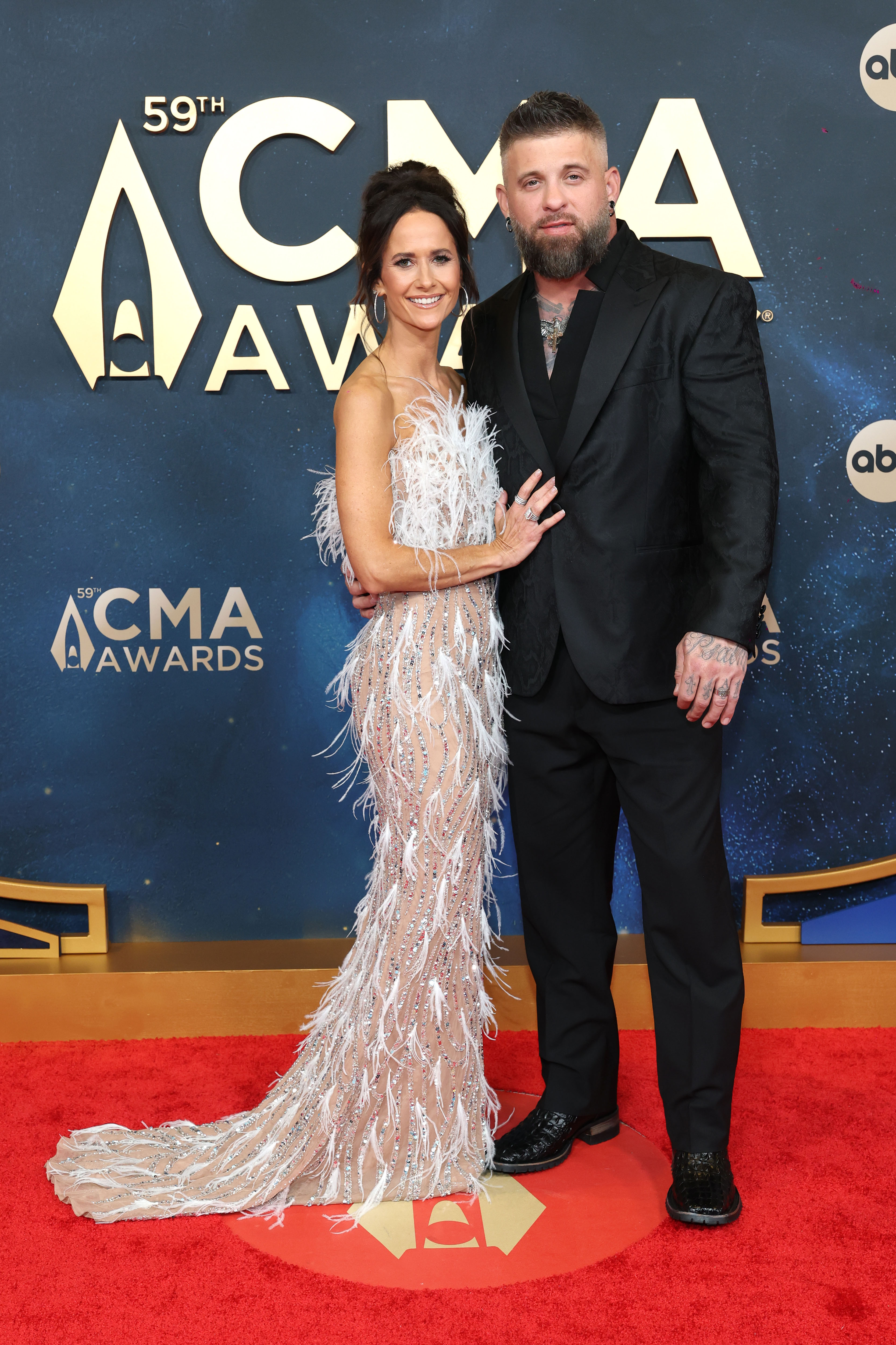 Amber Cochran Gilbert and Brantley Gilbert attend the 59th Annual Country Music Association Awards at Music City Center on November 19, 2025 in Nashville, Tennessee.