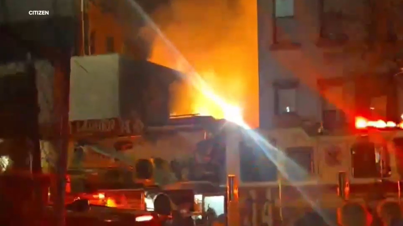 Massive blaze at outdoor beer garden in East Harlem spreads to nearby building