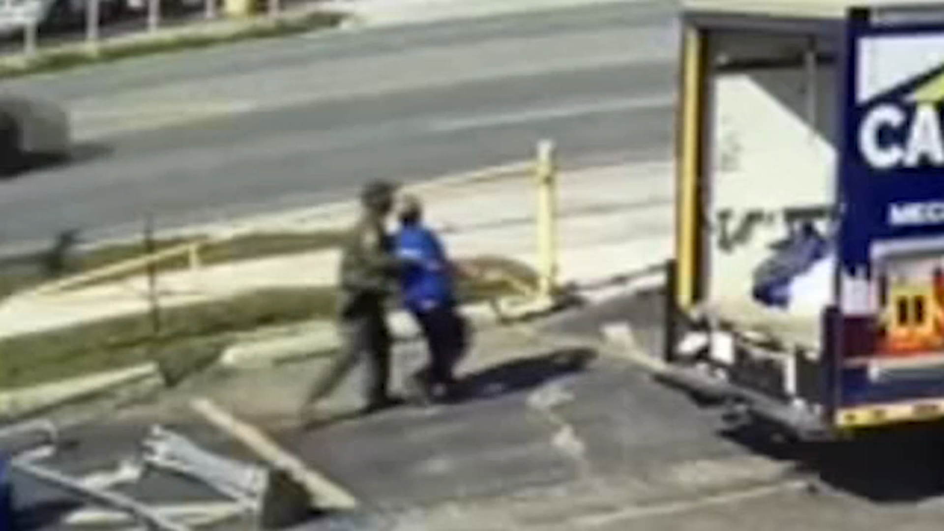 A still frame from surveillance video showing federal agents arresting Ramiro Cabrera on Oct. 3