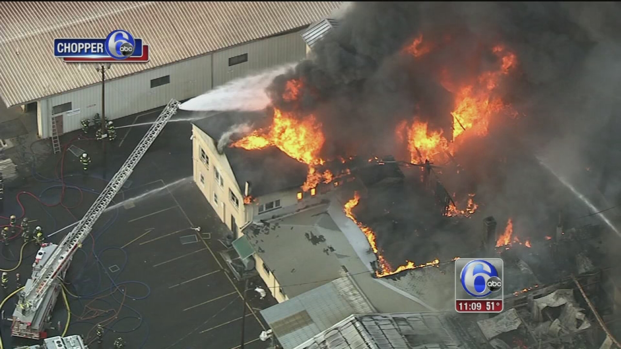 Fire crews battle 3-alarm blaze at business in Croydon, Pa.