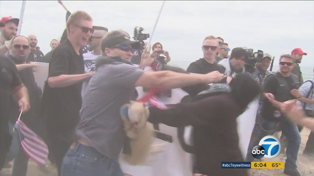 Trump supporters, protesters clash at OC march, rally