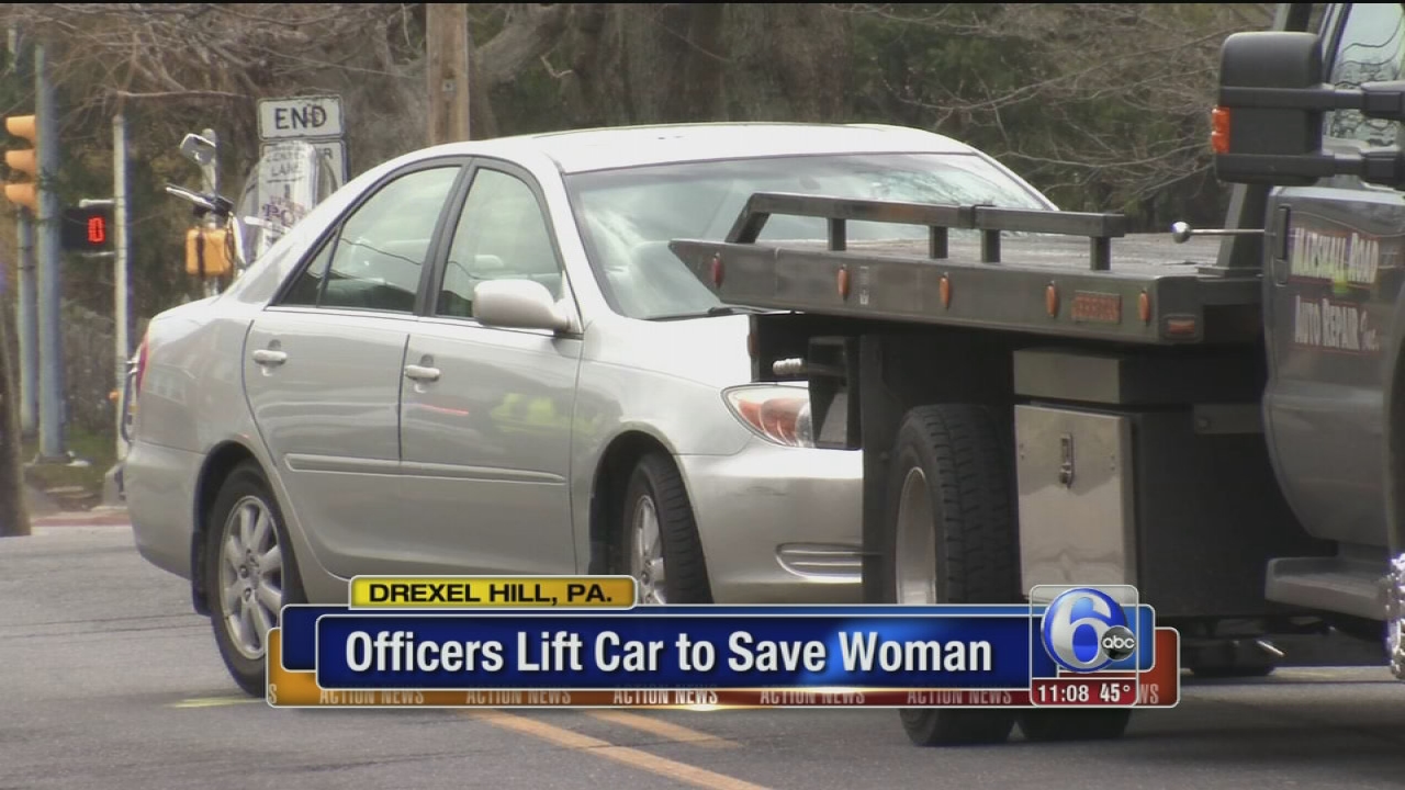 Officers lift car to save woman struck in Drexel Hill