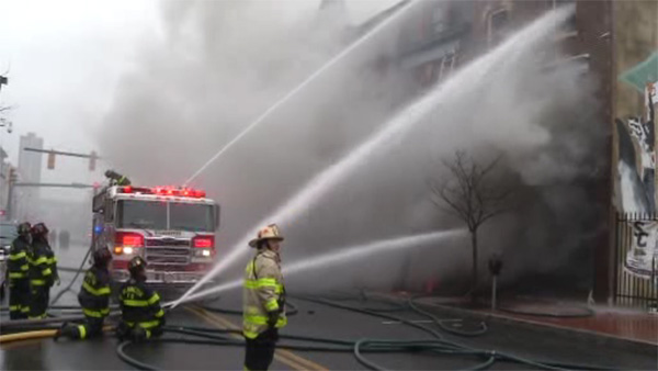 Fire crews continue to douse hot spots at Downtown Wilmington bldg.