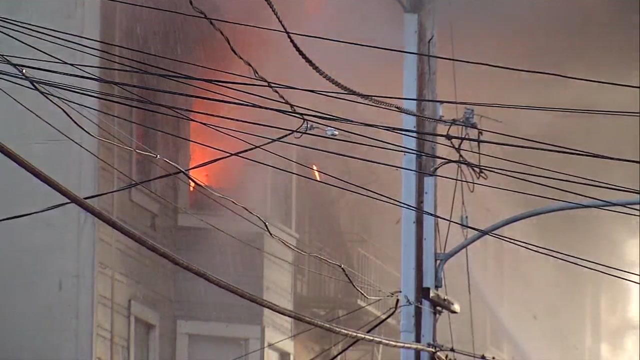 Coroner's office says at least 2 dead, multiple injuries in 4-alarm fire in Oakland