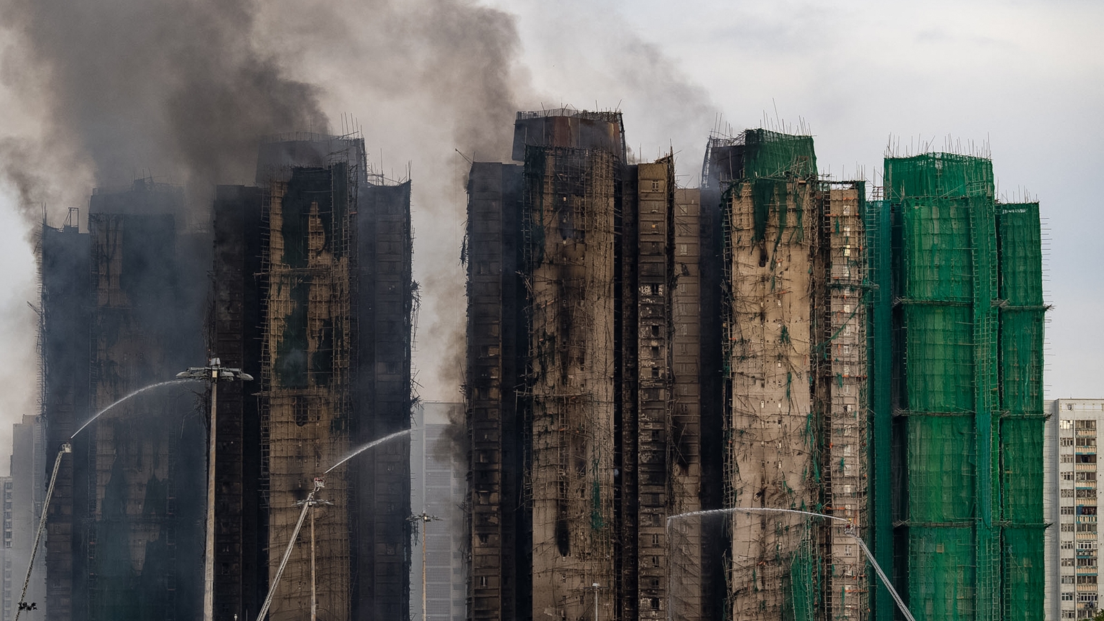 3 arrested, at least 94 dead as Hong Kong towers continue to burn