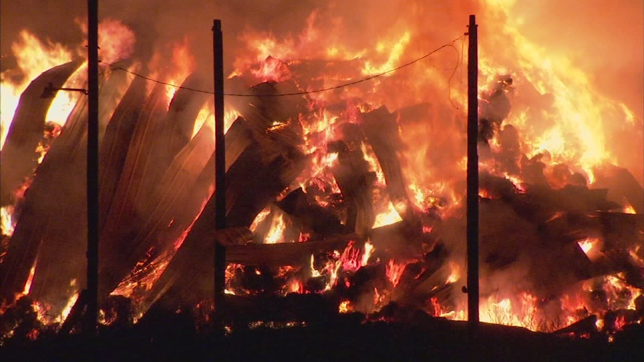 100 tons of hay on fire in Southwest Fresno