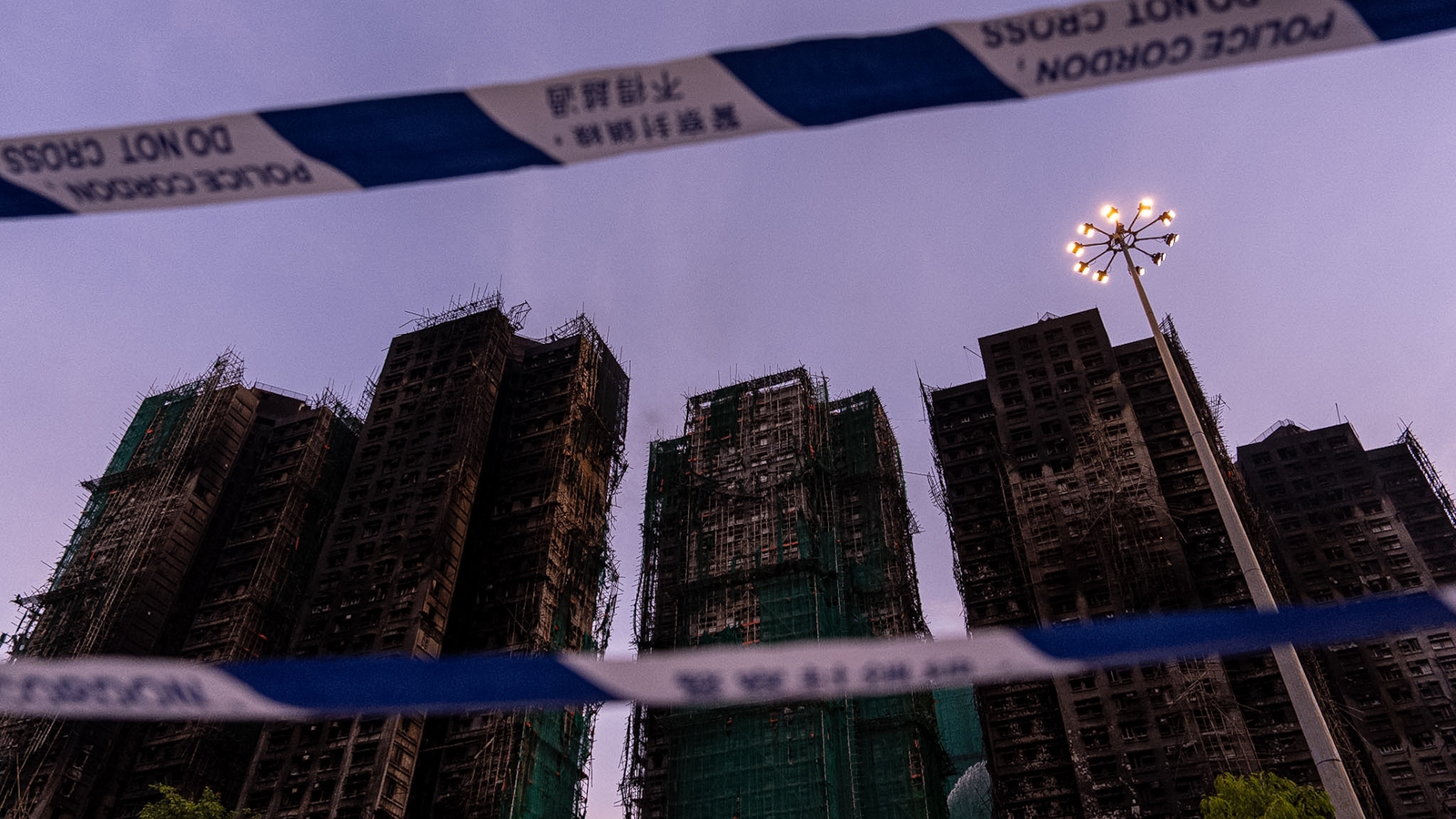 8 arrested as death toll for Hong Kong blaze raising to 128