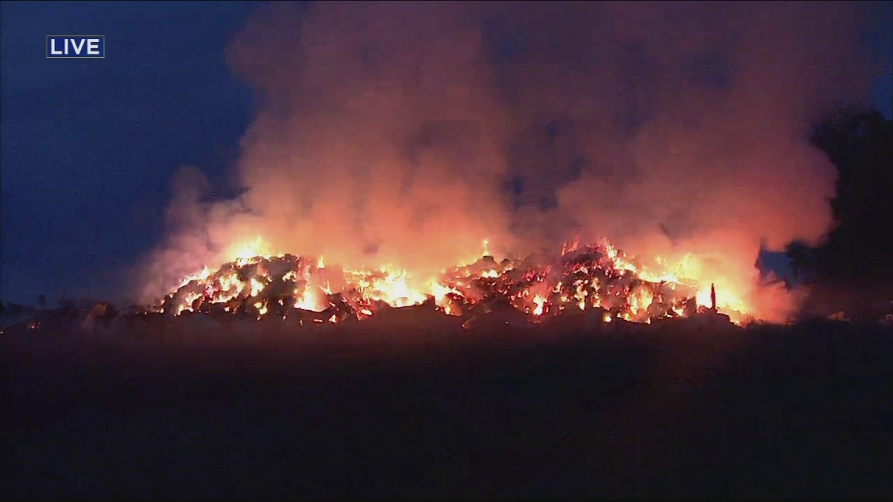 100 tons of hay on fire in Southwest Fresno