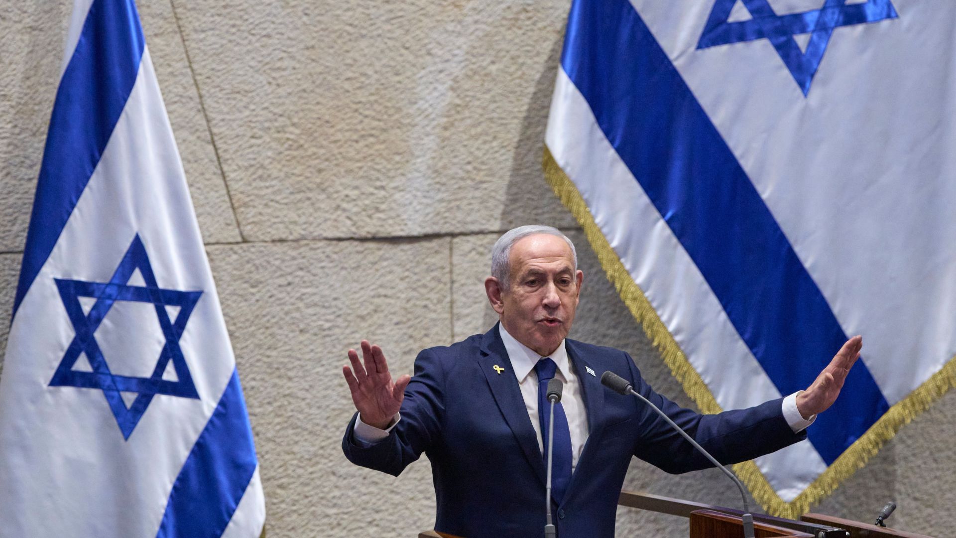 Israel's Prime Minister Benjamin Netanyahu addresses lawmakers in the Knesset, Israel's parliament, in Jerusalem, Monday, Nov. 10 2025.