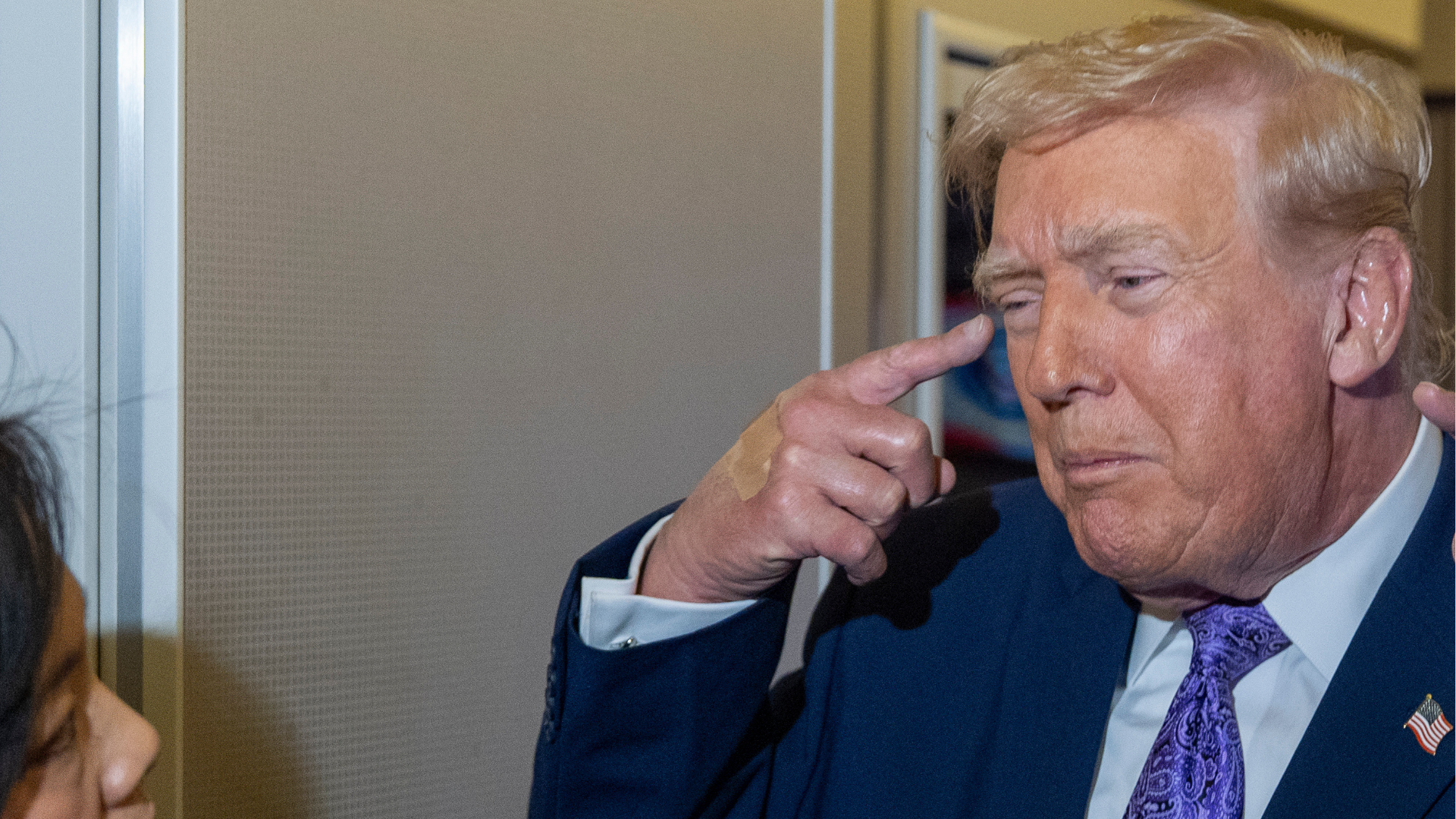 President Donald Trump speaks with reporters while in flight on Air Force One from his Mar-a-Lago estate in Palm Beach, Fla., to Joint Base Andrews, Sunday, Nov. 30, 2025.