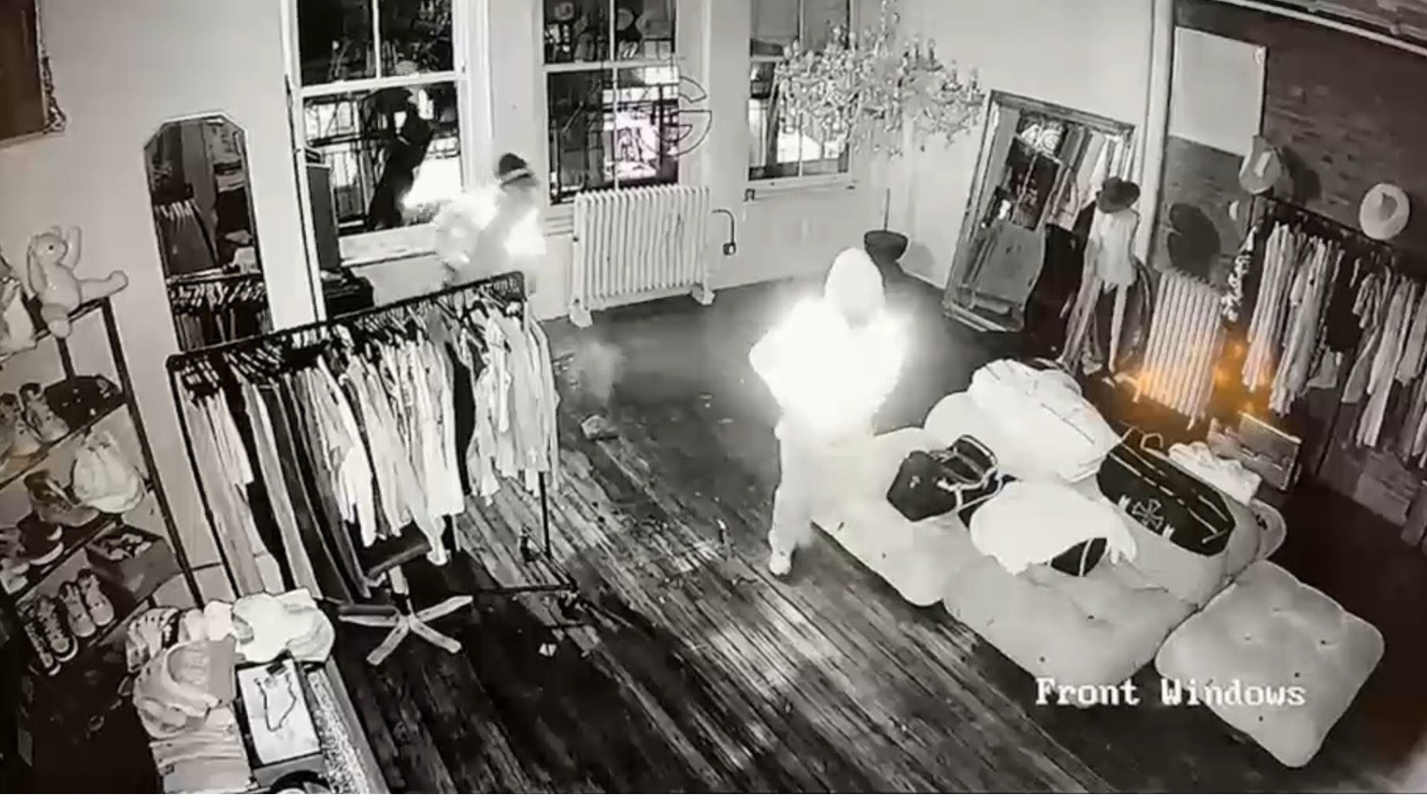 Surveillance video shows brazen heist at high-end boutique in New York City
