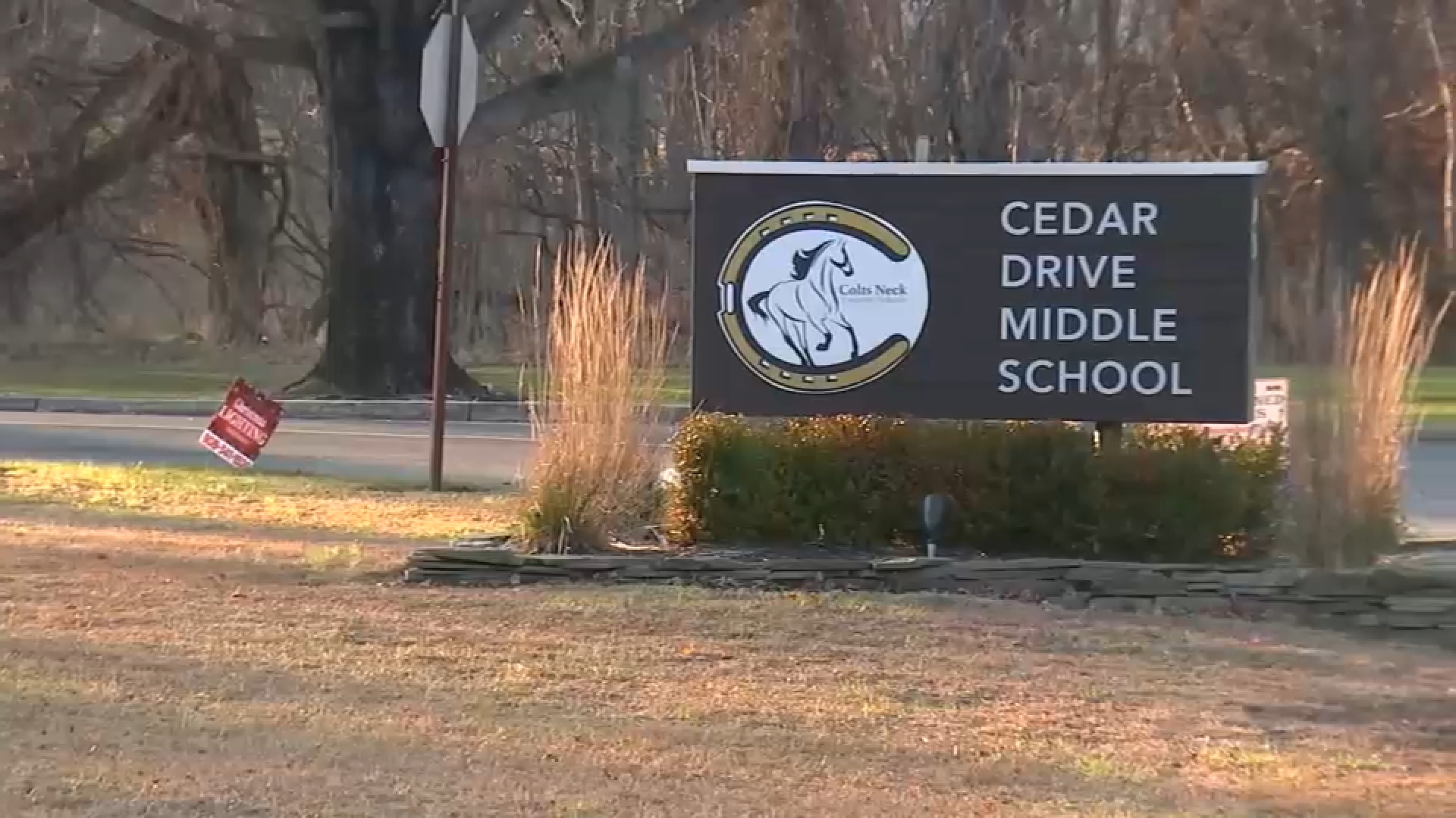 Controversy over secretary of education's visit to NJ school