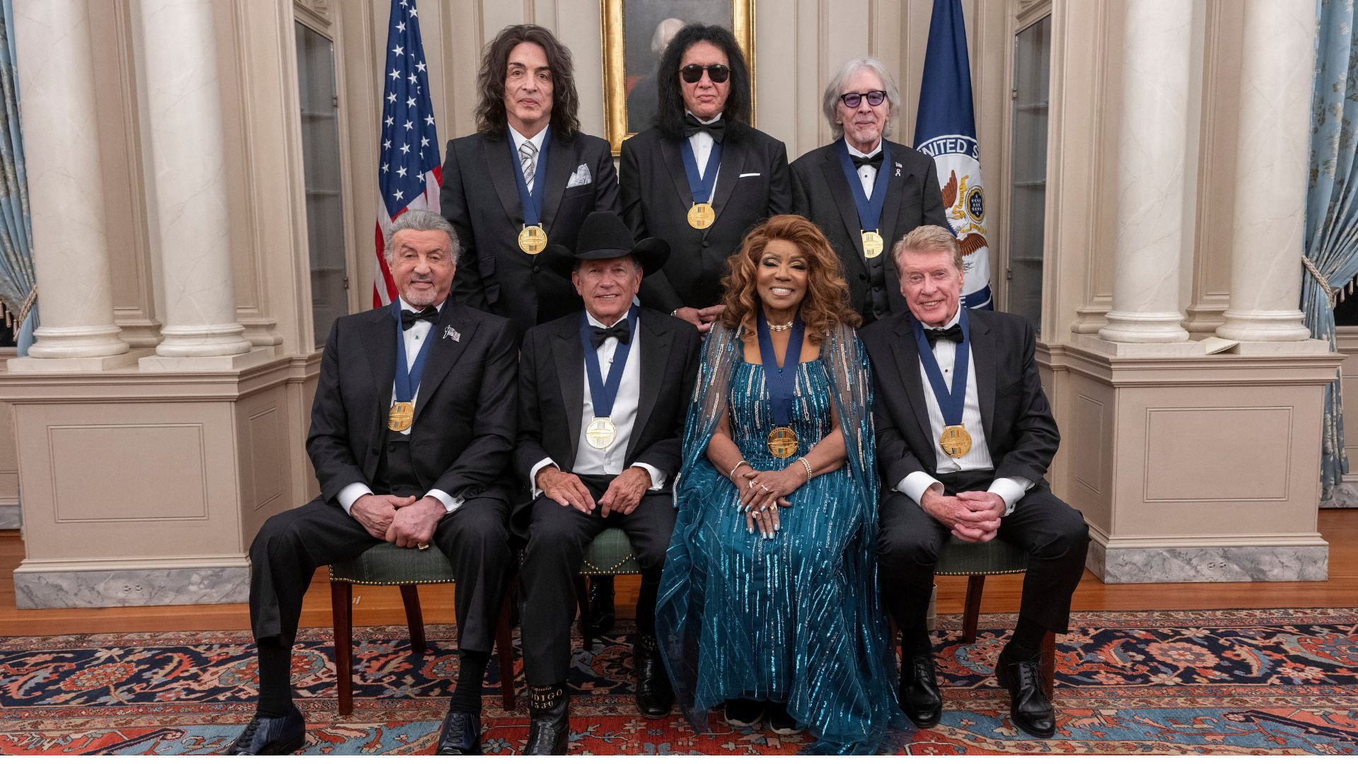The 2025 Kennedy Center Honorees pose for a group photo at the 48th Kennedy Center Honors Medallion Reception, Dec. 6, 2025 in Washington.