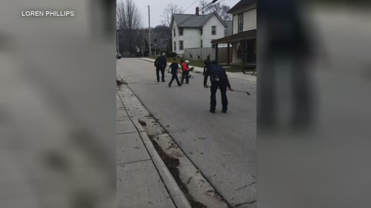 Instead of ending street hockey game, cops join in
