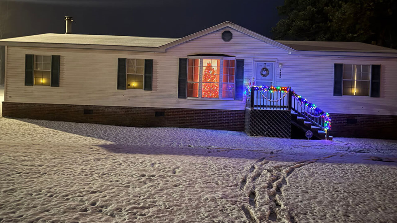 Sharon Powell of Littleton in Halifax County said it was "scary" driving home from work, but she was able to enjoy a white Christmas scene when she got home.