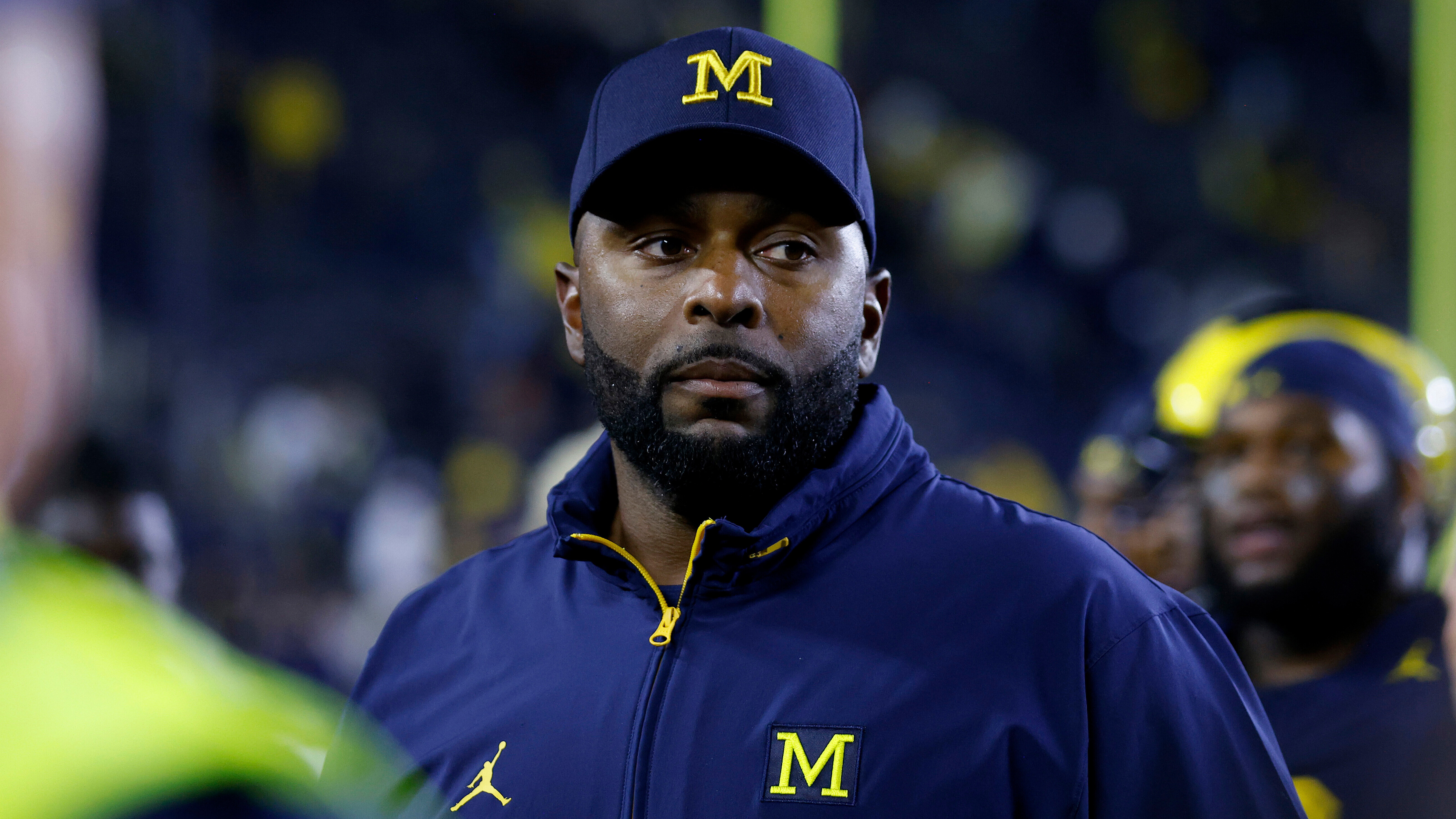 Michigan coach Sherrone Moore walks off the field following an NCAA football game on Saturday, Aug. 30, 2025, in Ann Arbor, Mich.