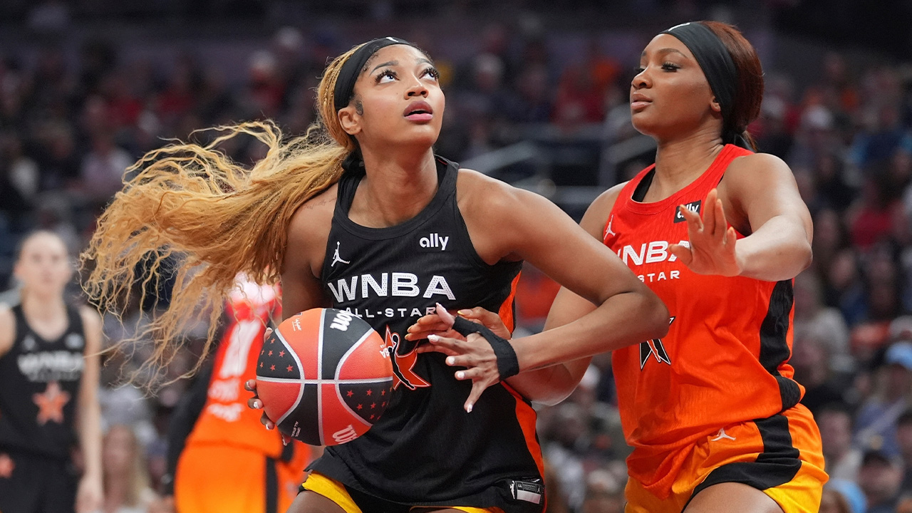 Chicago Sky's Angel Reese, left, shoots against Washington Mystics' Kiki Iriafen during the second half of a WNBA All-Star basketball game, July 19, 2025, in Indianapolis.