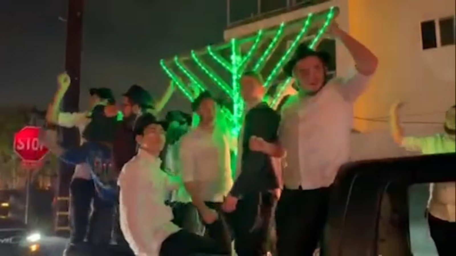 Hanukkah Menorah Parade lights up Fairfax District as participants remember those slain in Australia