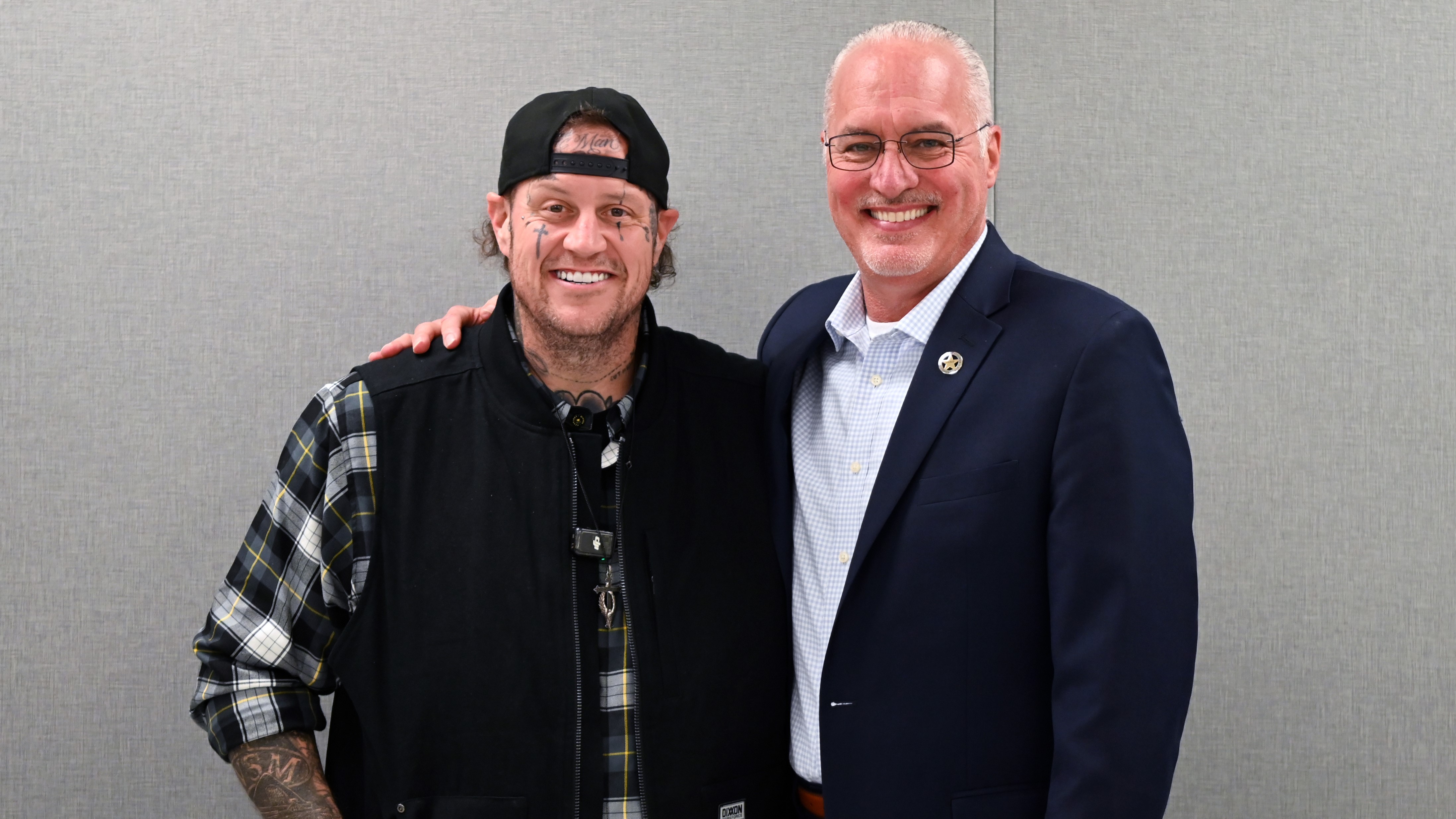 This photo provided by the Nashville-Davidson Co. Sheriff's Office shows country music star Jelly Roll posing for a photo with Davidson County Sheriff Daron Hall on Nov. 25, 2025.