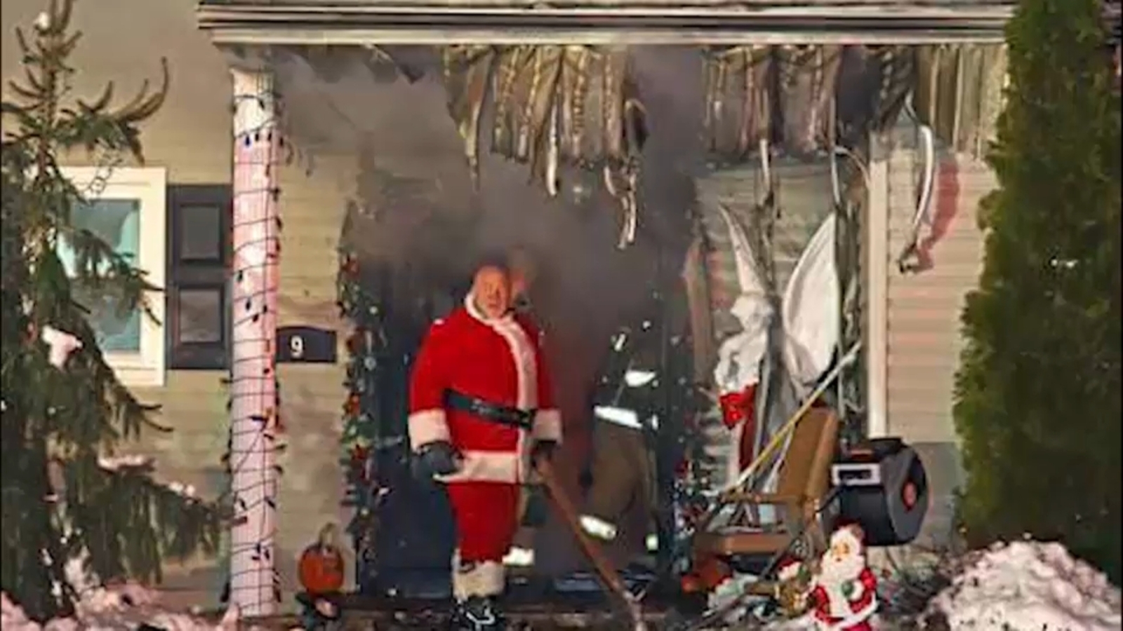 Firefighter battles New Jersey house fire while dressed as Santa Claus