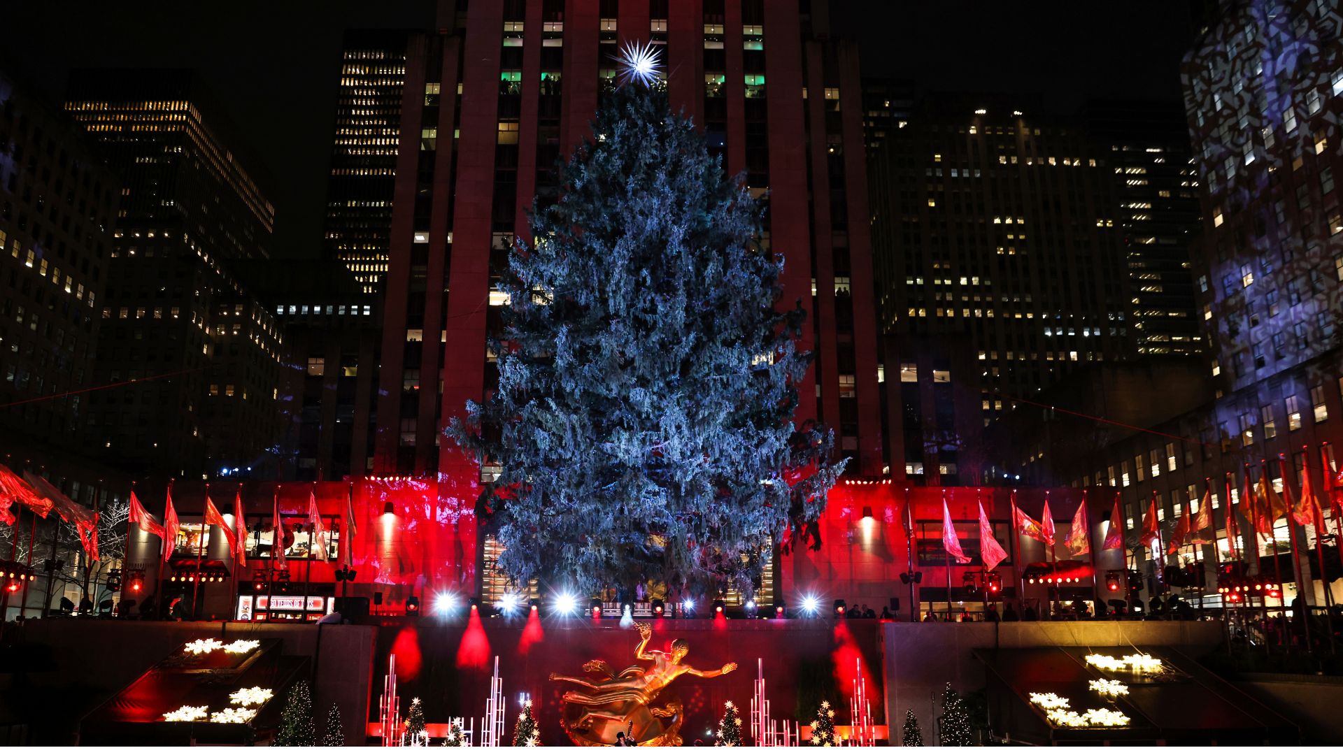 Katherine McPhee and David Foster perform during the 90th annual Rockefeller Center Christmas tree lighting ceremony, Wednesday, Nov. 30, 2022, in New York.