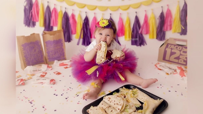 baby celebrates 1st birthday with taco bell themed photo shoot