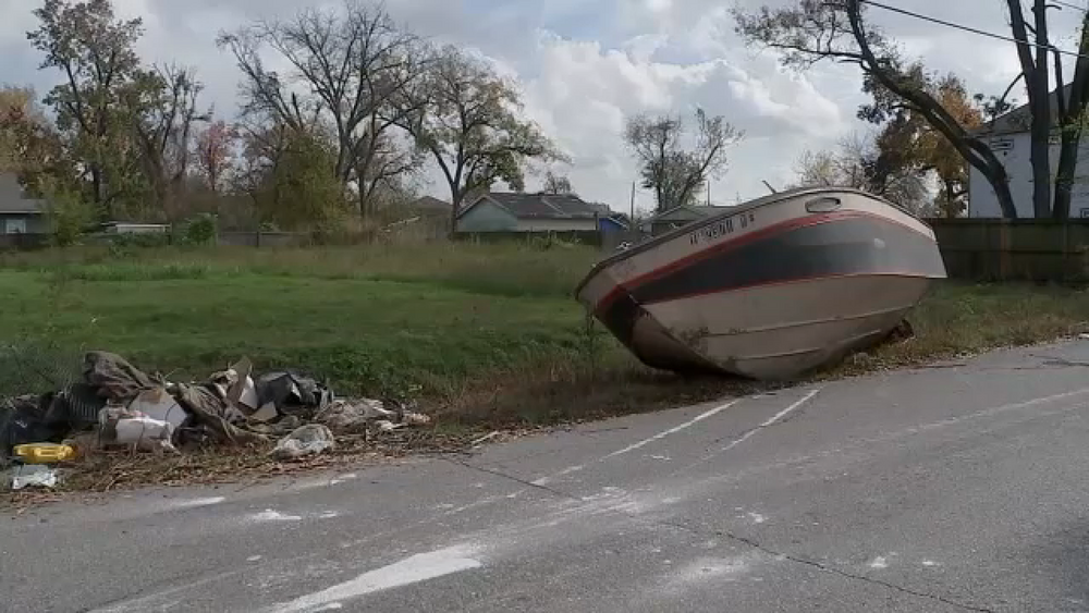 Neighbors say boat left on road is latest example of illegal dumping in Acres Home area