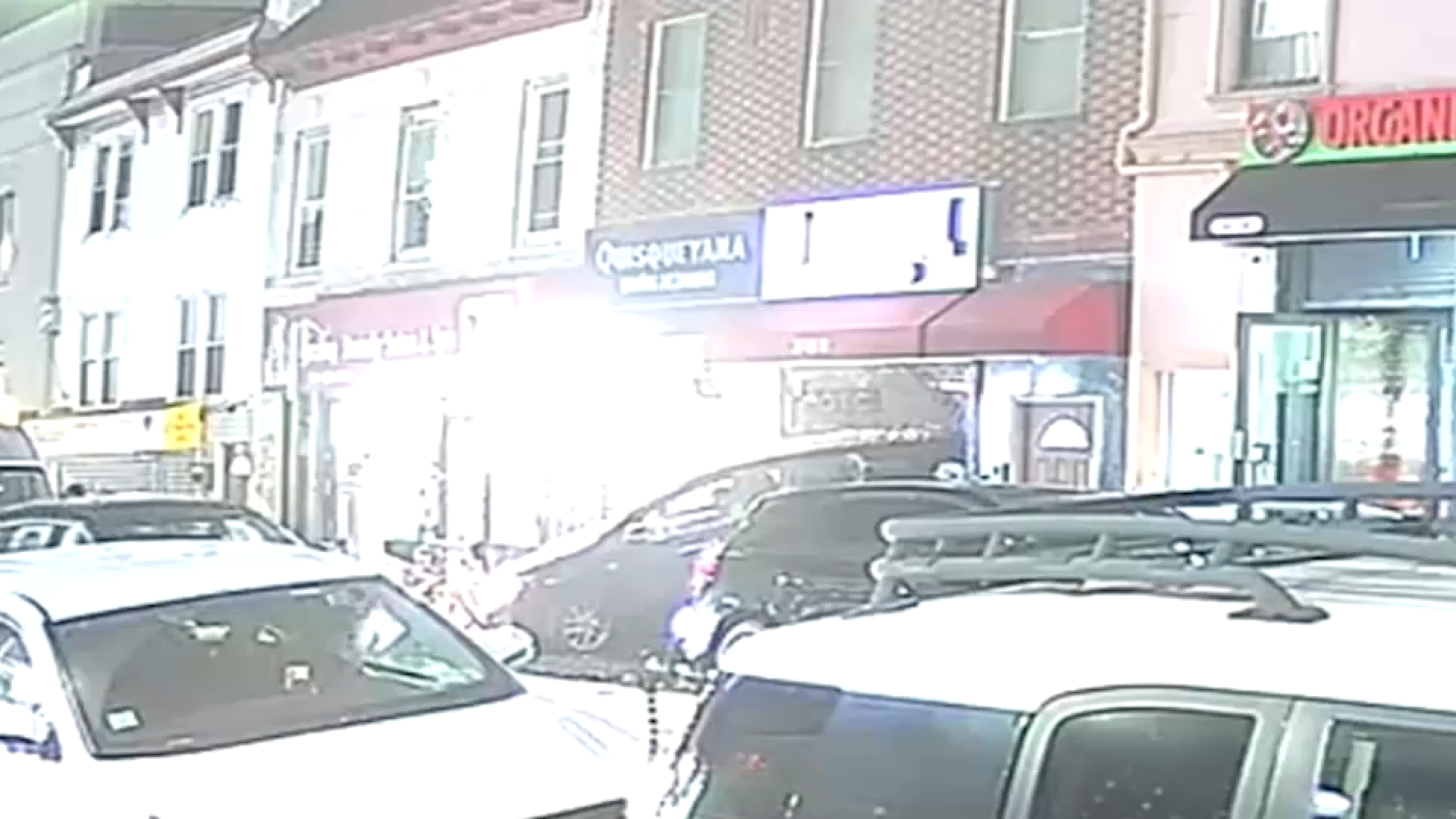 Car crashes into building in Queens sending 3 people to the hospital